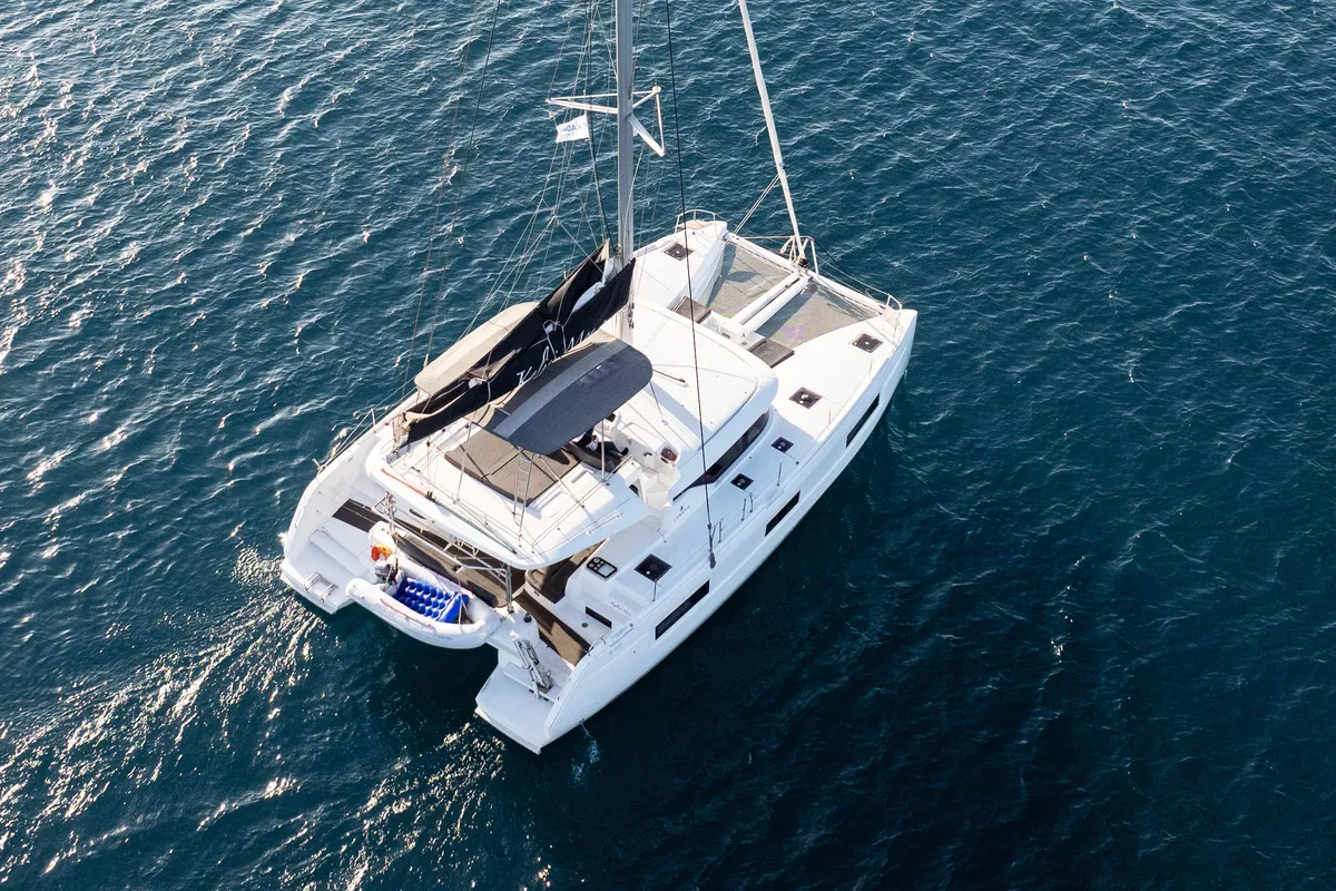 Exterior view of Kalisi Mou, a Lagoon 46 catamaran at Parikia, Greece