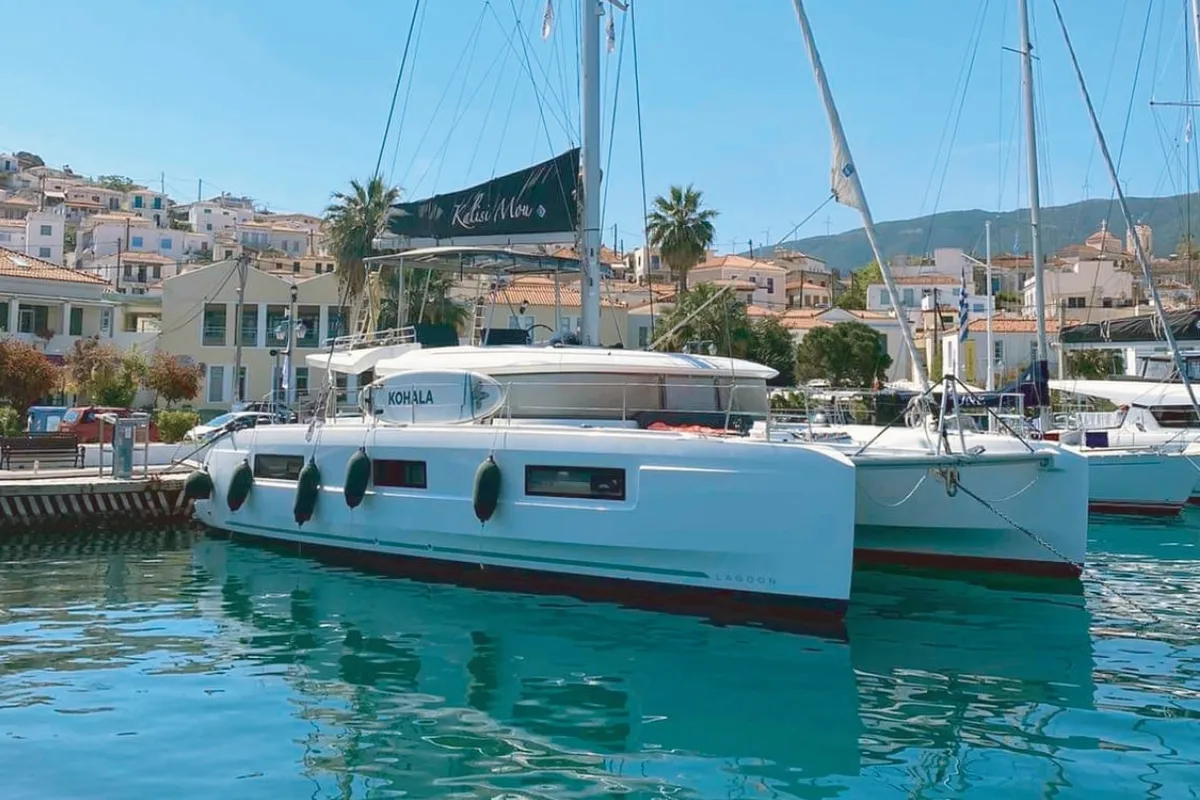 Exterior view of Kalisi Mou, a Lagoon 46 catamaran at Parikia, Greece