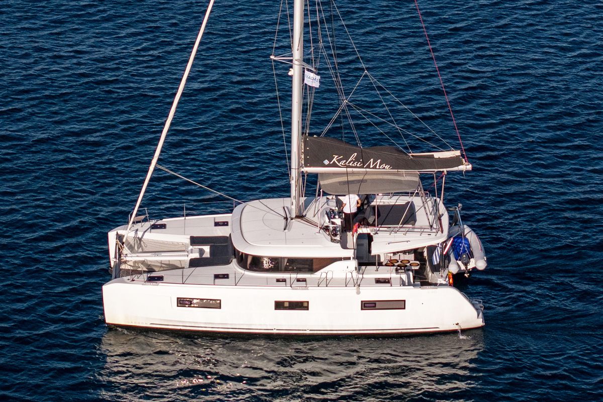 Exterior view of Kalisi Mou, a Lagoon 46 catamaran at Parikia, Greece