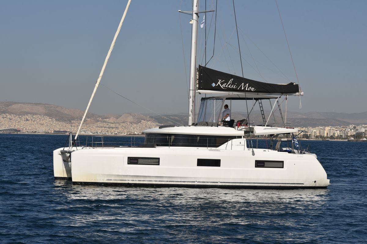 Exterior view of Kalisi Mou, a Lagoon 46 catamaran at Parikia, Greece