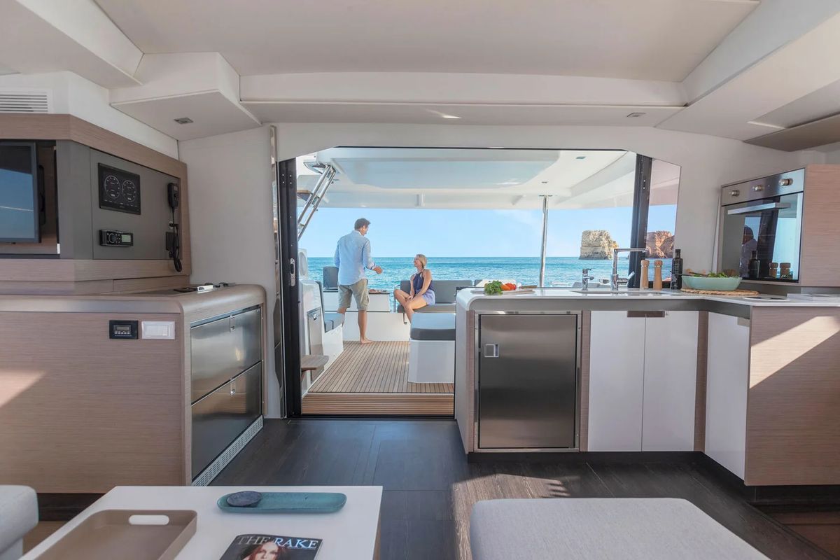 Salon of BLU DOLPHIN, a Fountaine Pajot Elba 45 catamaran at Capo d'Orlando, Italy