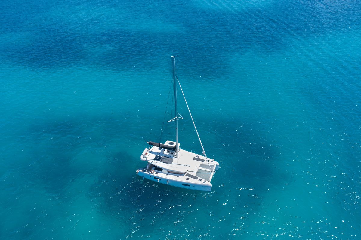 Exterior view of Athena Pearl, a Lagoon 42 catamaran at Eden Island Marina, Seychelles