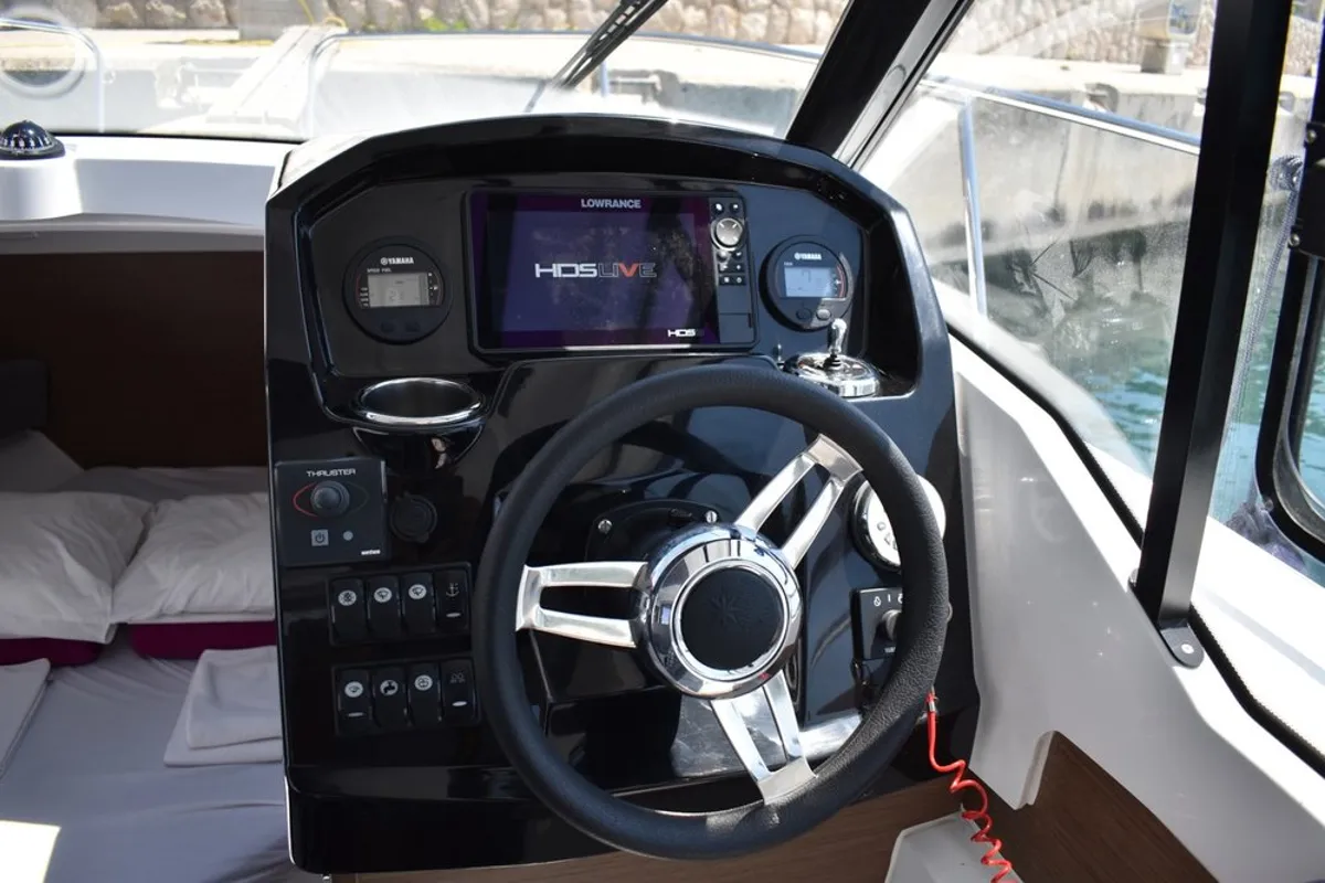 Cockpit of Posejdon, a Jeanneau Merry Fisher 795 motorboat at Mali Lošinj, Croatia