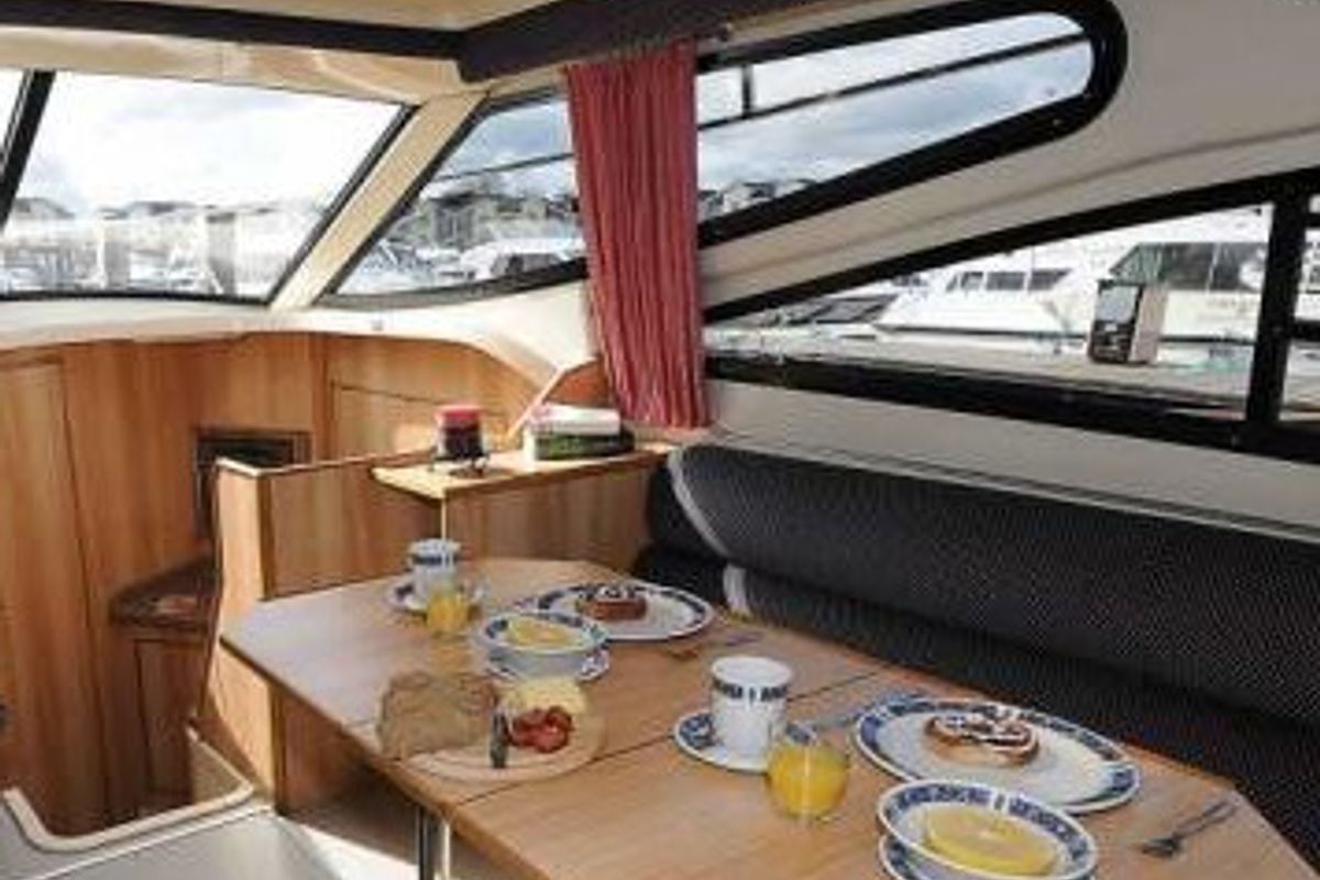 Salon of Consul Budget 9, a Cygnet Consul motorboat at Laggan, United Kingdom