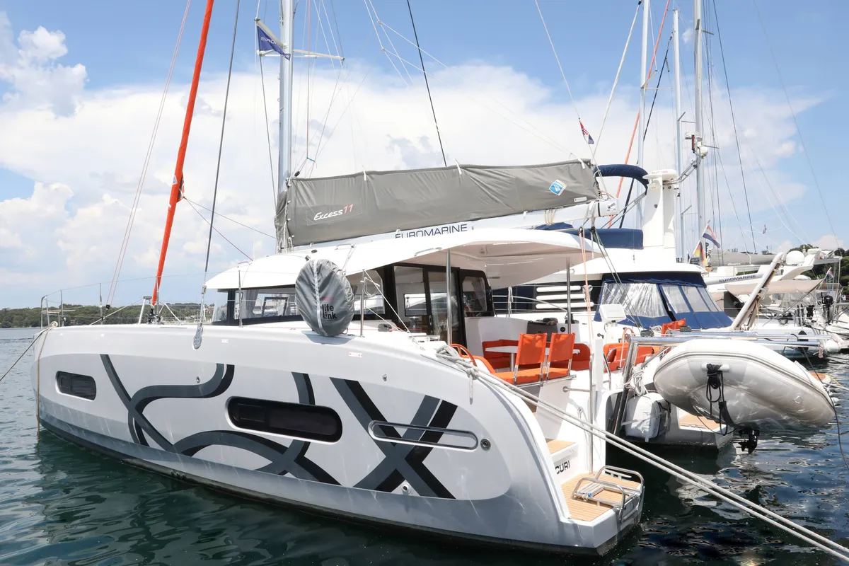 Dioscuri, a Excess 11 - 4 + 1 + 1 cab. catamaran at Split, Croatia
