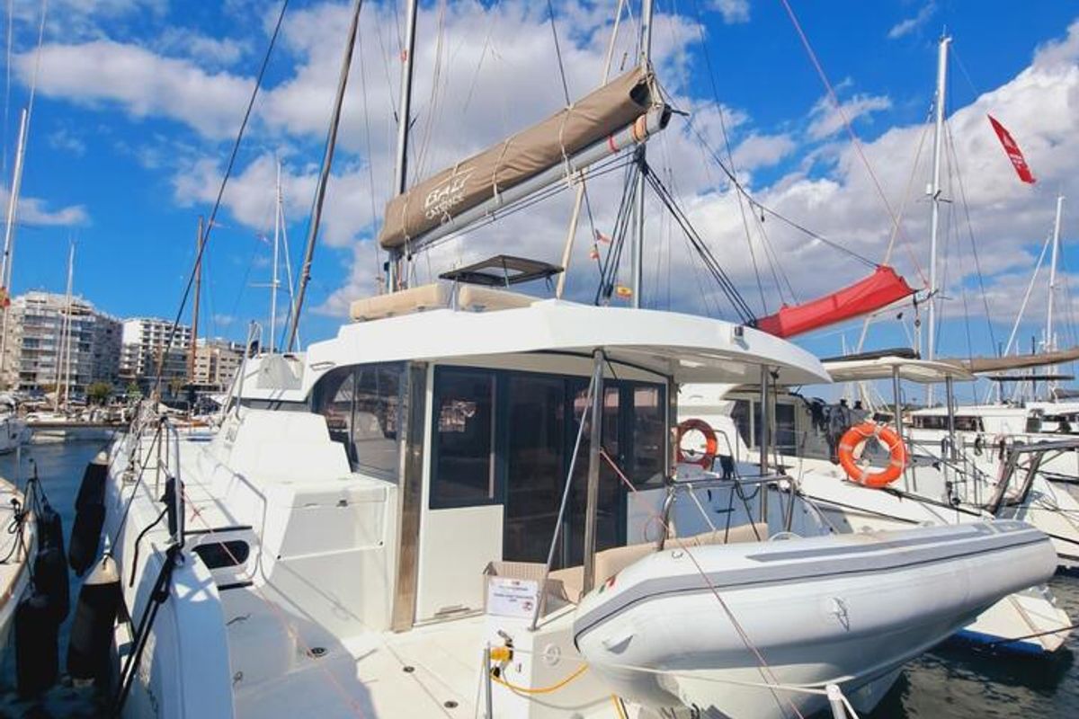 Exterior view of La Boheme, a Bali Catspace catamaran at Sant Antoni de Portmany, Spain