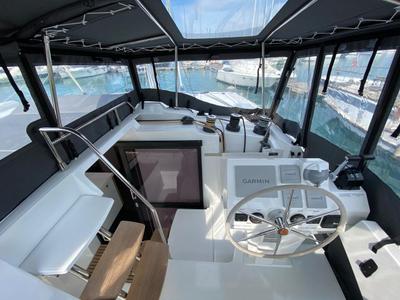Cockpit of Ooga Chaka, a Fountaine Pajot Astrea 42 catamaran at Sithonia Municipal Unit, Greece