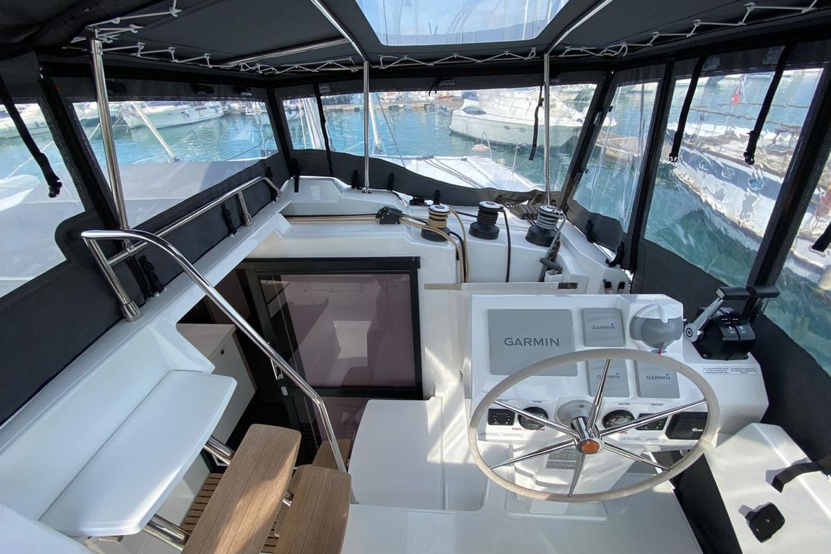 Cockpit of Ooga Chaka, a Fountaine Pajot Astrea 42 catamaran at Sithonia Municipal Unit, Greece