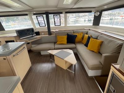 Salon of Red Rose, a Fountaine Pajot Saona 47 Quintet catamaran at Agios Stefanos, Greece