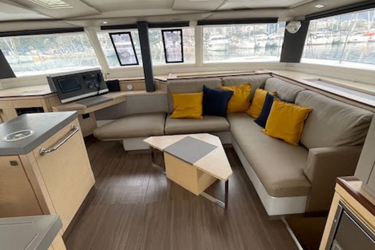Salon of Red Rose, a Fountaine Pajot Saona 47 Quintet catamaran at Agios Stefanos, Greece