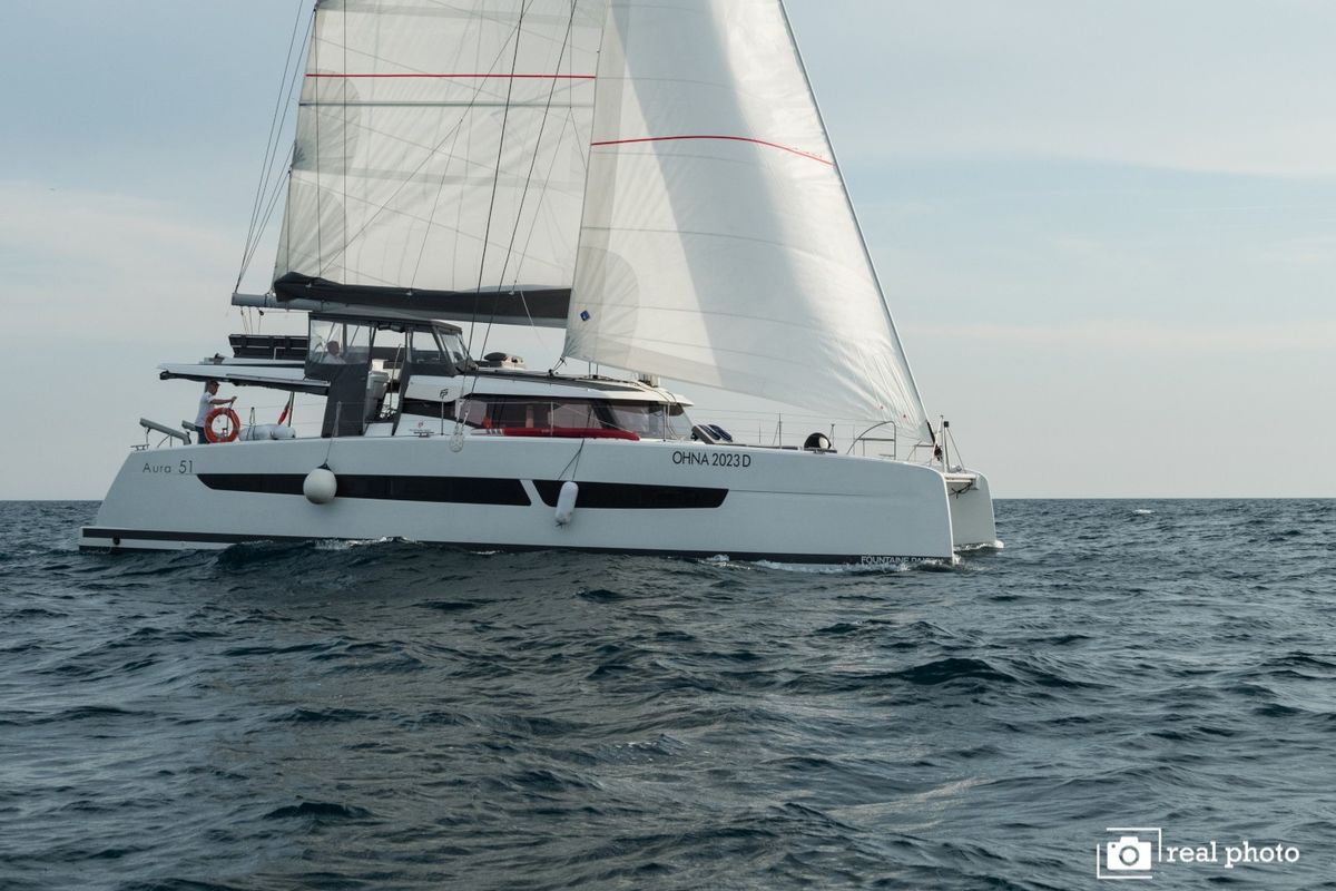Exterior view of Papa Charlie, a Fountaine Pajot Aura 51 catamaran at Cannigione, Italy