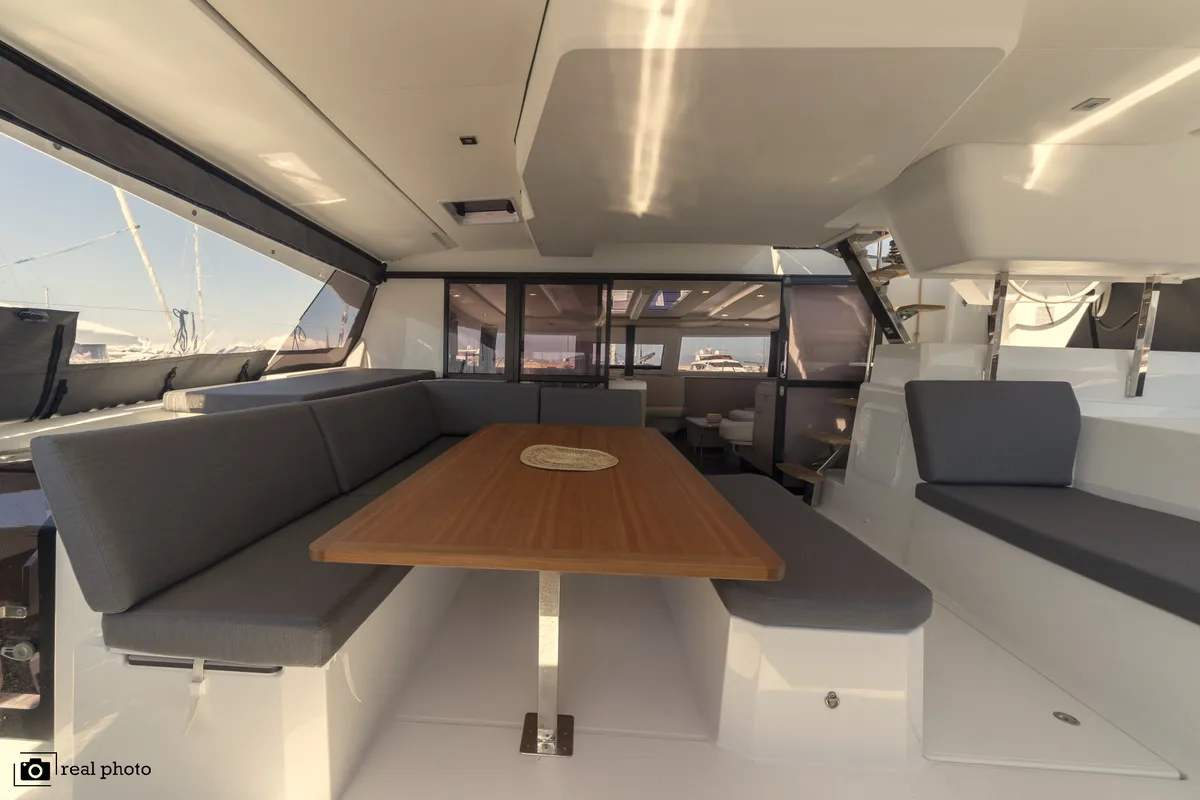 Deck of Papa Charlie, a Fountaine Pajot Aura 51 catamaran at Cannigione, Italy