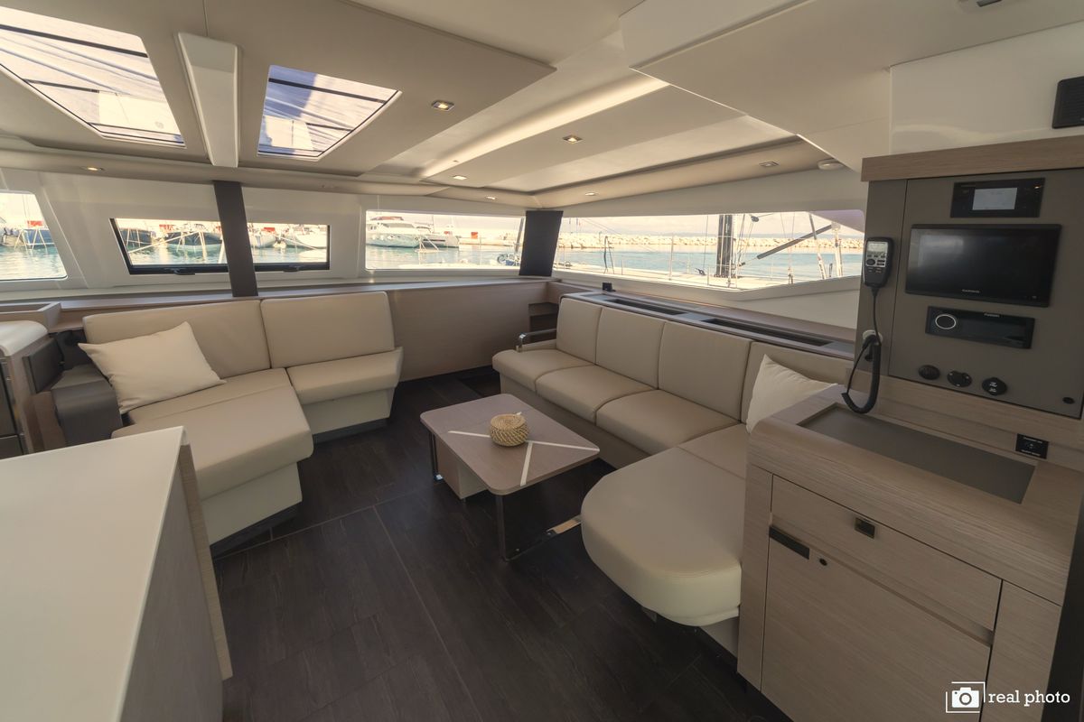 Salon of Papa Charlie, a Fountaine Pajot Aura 51 catamaran at Cannigione, Italy