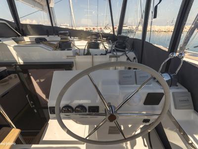 Cockpit of Papa Charlie, a Fountaine Pajot Aura 51 catamaran at Cannigione, Italy