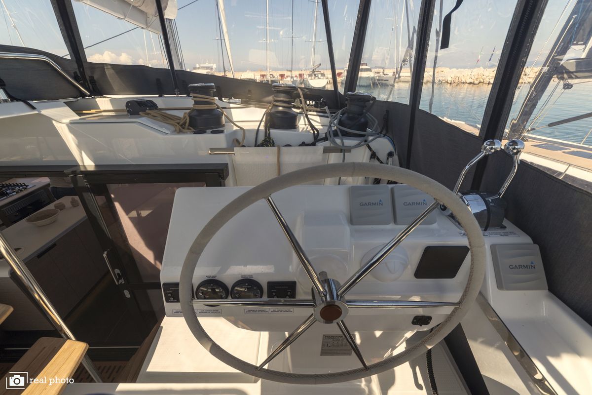 Cockpit of Papa Charlie, a Fountaine Pajot Aura 51 catamaran at Cannigione, Italy