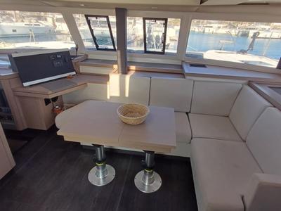 Salon of Cicada, a Fountaine Pajot Astrea 42 catamaran at Lavreotiki Municipal Unit, Greece