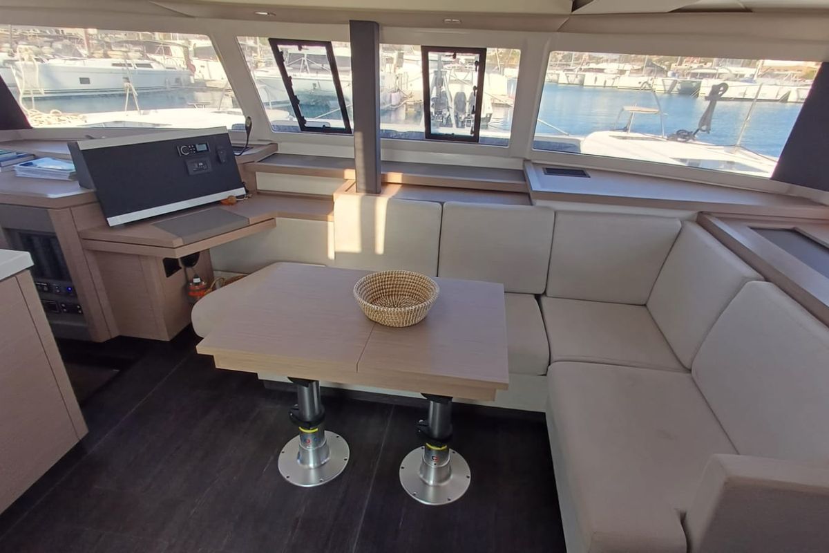 Salon of Cicada, a Fountaine Pajot Astrea 42 catamaran at Lavreotiki Municipal Unit, Greece