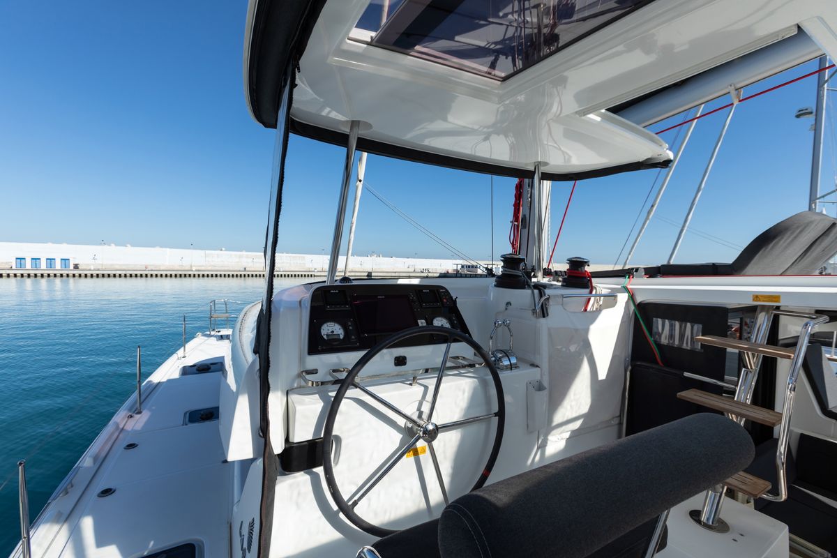 Cockpit of Nacatuli, a Lagoon 42 catamaran at Capo d'Orlando, Italy