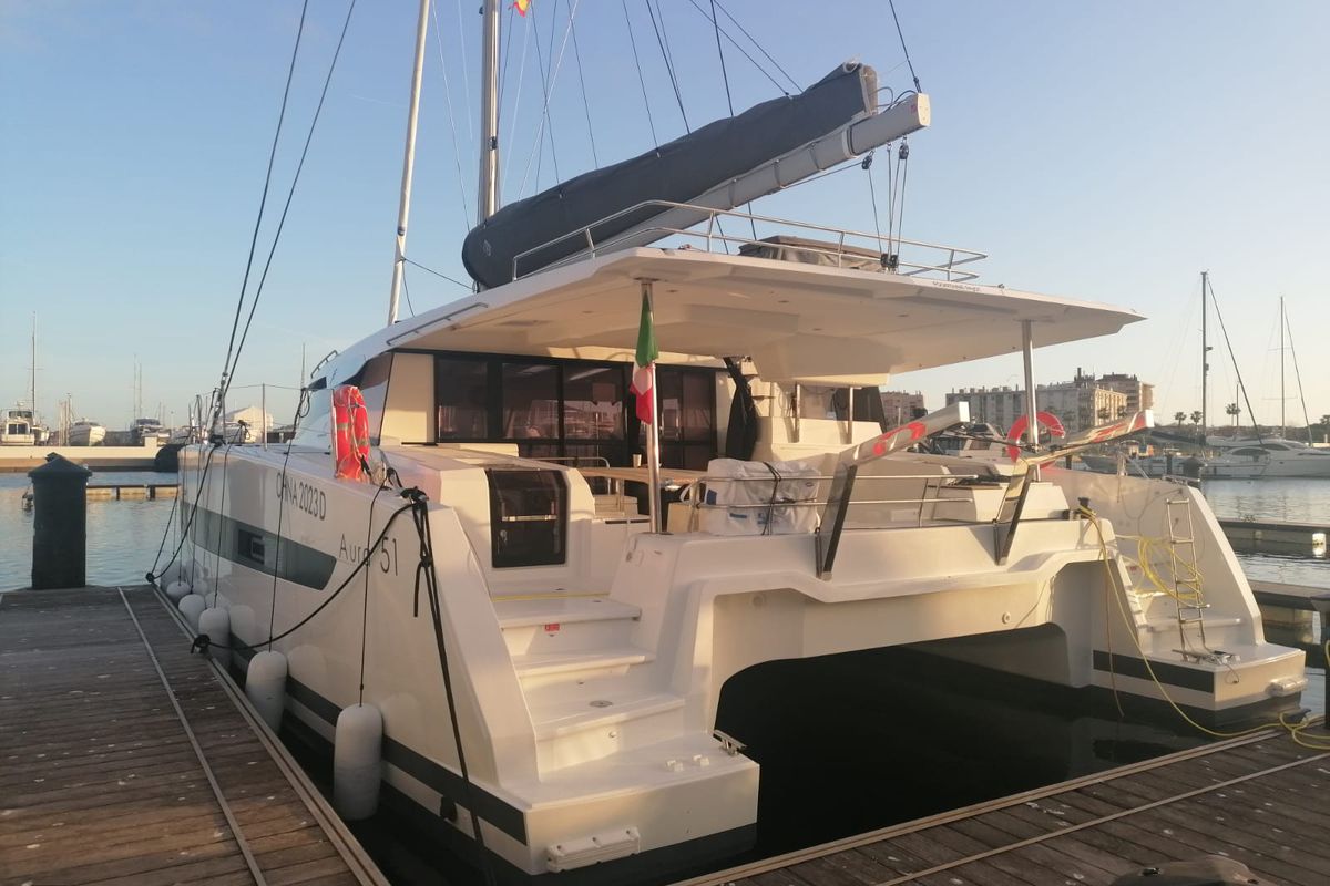 Exterior view of Papa Charlie, a Fountaine Pajot Aura 51 catamaran at Cannigione, Italy
