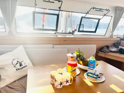 Salon of One Mallorca Crewed, a Excess 11 catamaran at Port d'Andratx, Spain