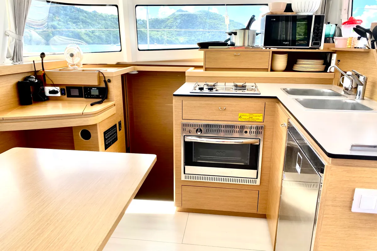 Galley of One Mallorca Crewed, a Excess 11 catamaran at Port d'Andratx, Spain