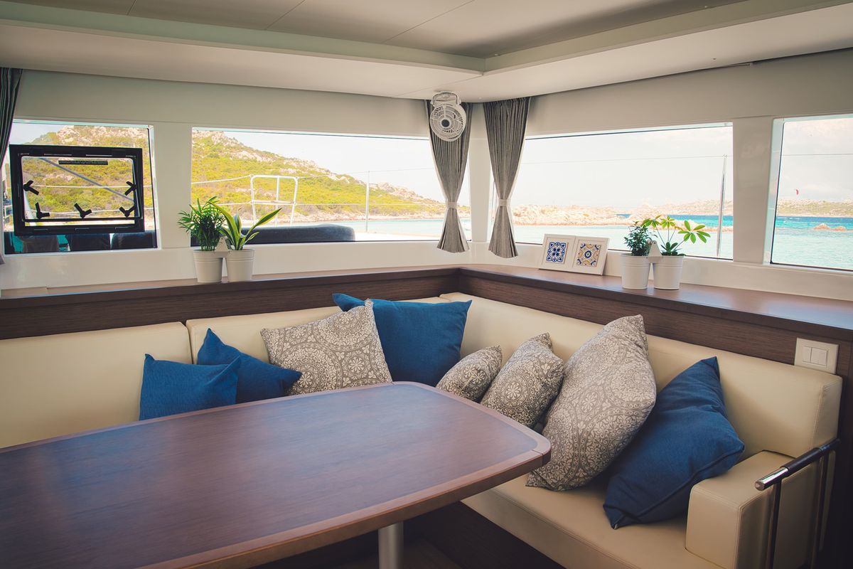 Salon of Pollo, a Lagoon 450 Fly catamaran at Lu Palau/Palau, Italy