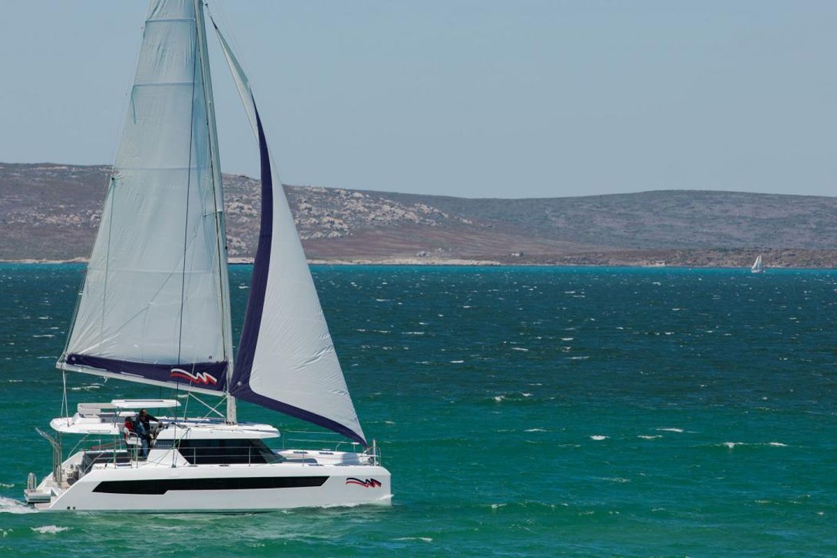 Exterior view of Moorings 4200/3/3 Club, a Leopard 42 catamaran at Uturoa, France