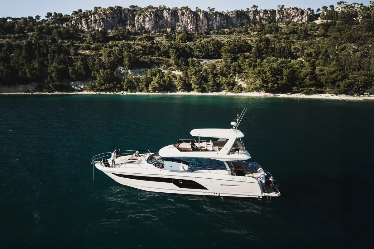 Exterior view of Shaft, a Jeanneau Prestige 590 Flybridge yacht at Podstrana - Miljevac, Croatia