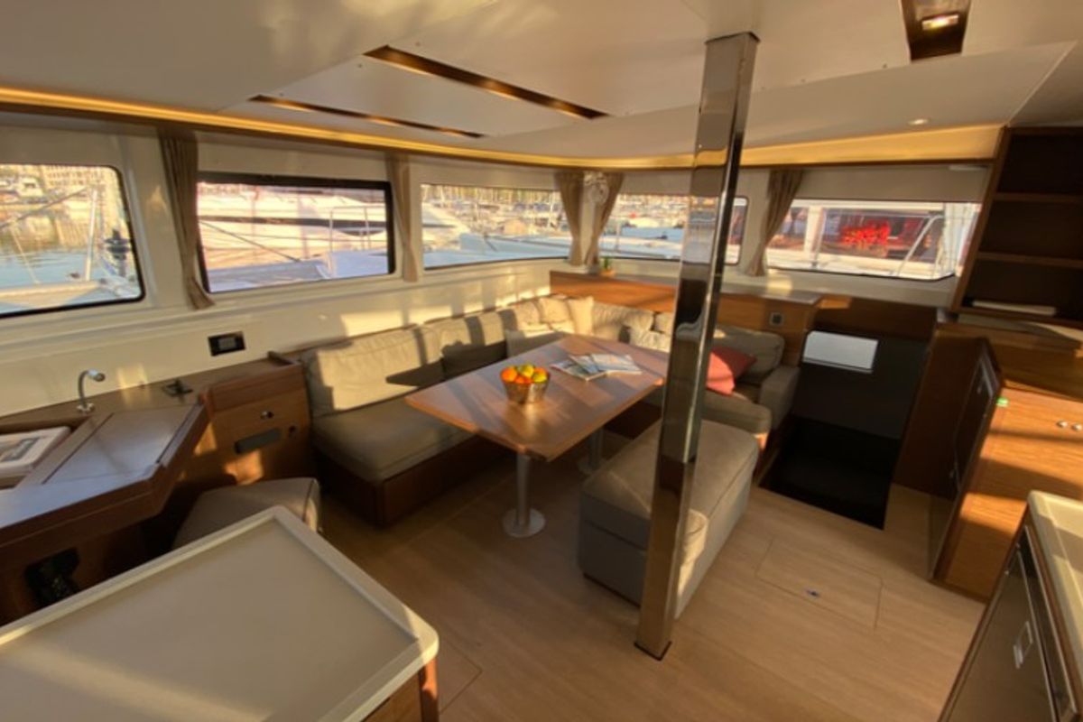 Salon of Les Jumeaux, a Lagoon 46 OW catamaran at Ventimiglia, Italy
