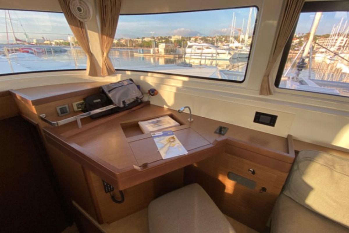 Salon of Les Jumeaux, a Lagoon 46 OW catamaran at Ventimiglia, Italy