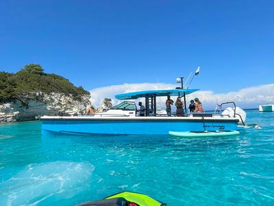 Exterior view of Oktana, a Axopar 37  Sun Top motorboat at Gouvia, Greece