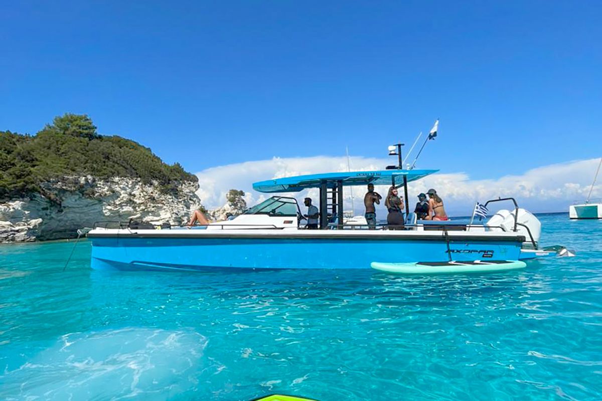 Exterior view of Oktana, a Axopar 37 Sun Top motorboat at Gouvia, Greece