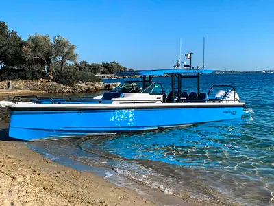 Exterior view of Oktana, a Axopar 37 Sun Top motorboat at Gouvia, Greece