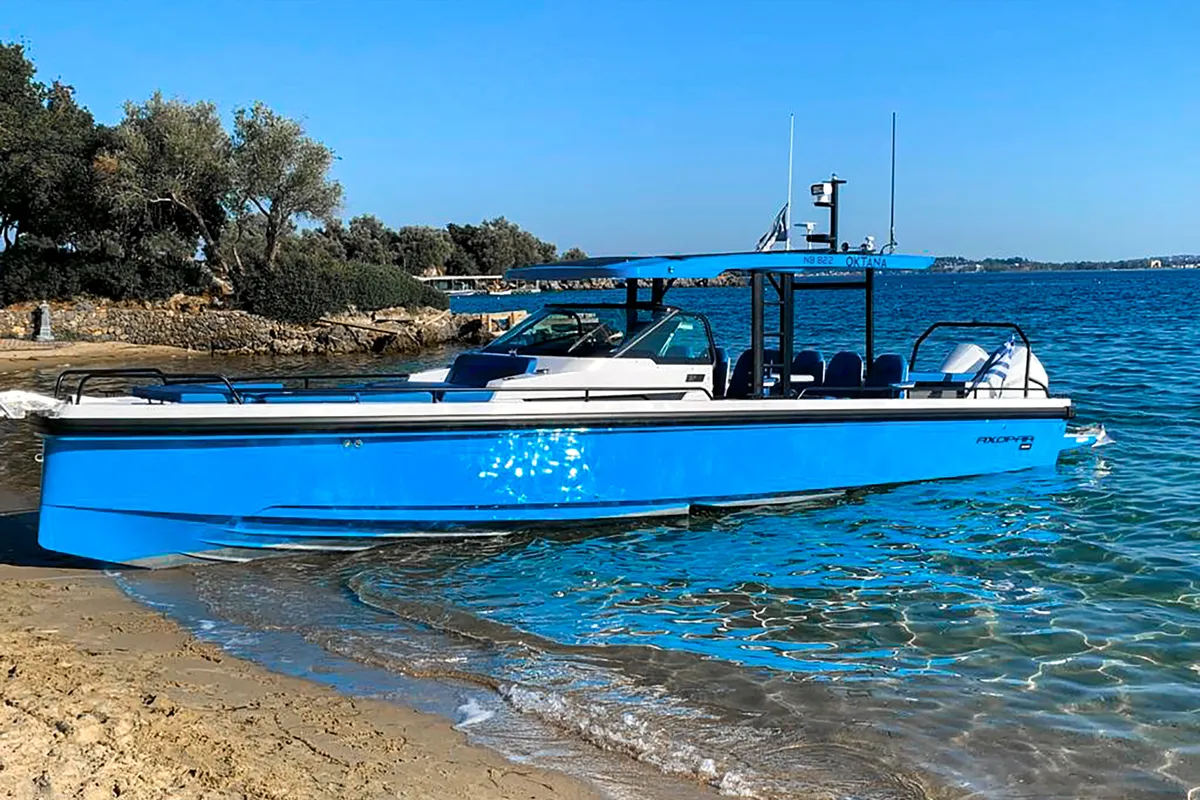 Exterior view of Oktana, a Axopar 37  Sun Top motorboat at Gouvia, Greece