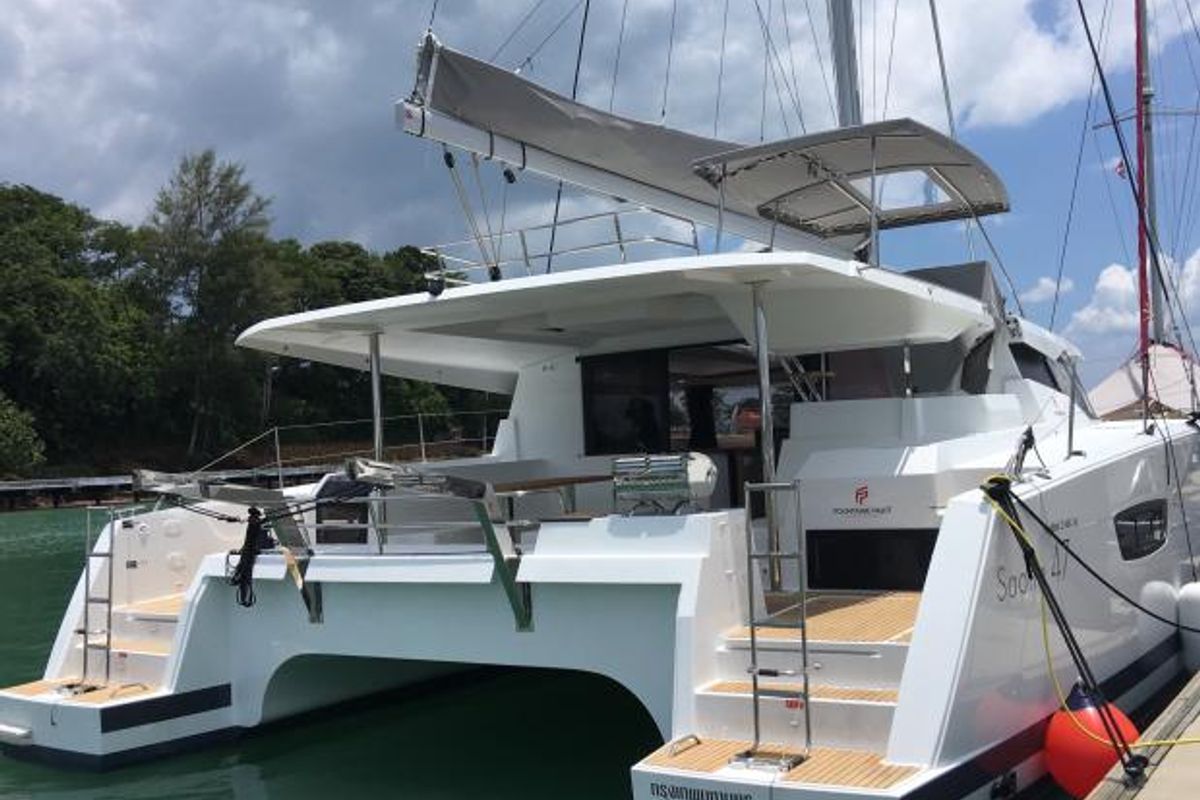 Exterior view of Lola 2, a Fountaine Pajot Saona 47 catamaran at Mai Khao, Thailand