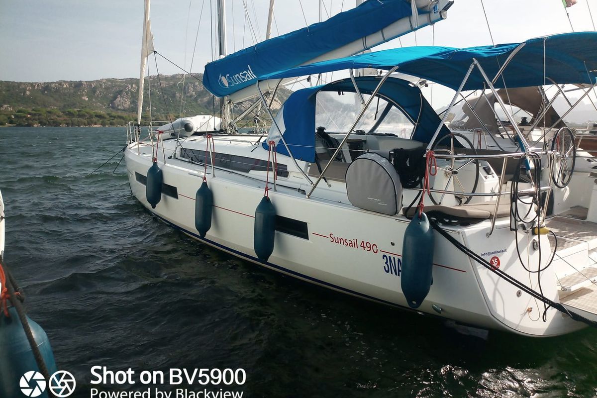 Exterior view of Agatha, a Jeanneau Sun Odyssey 490 sailboat at Cannigione, Italy