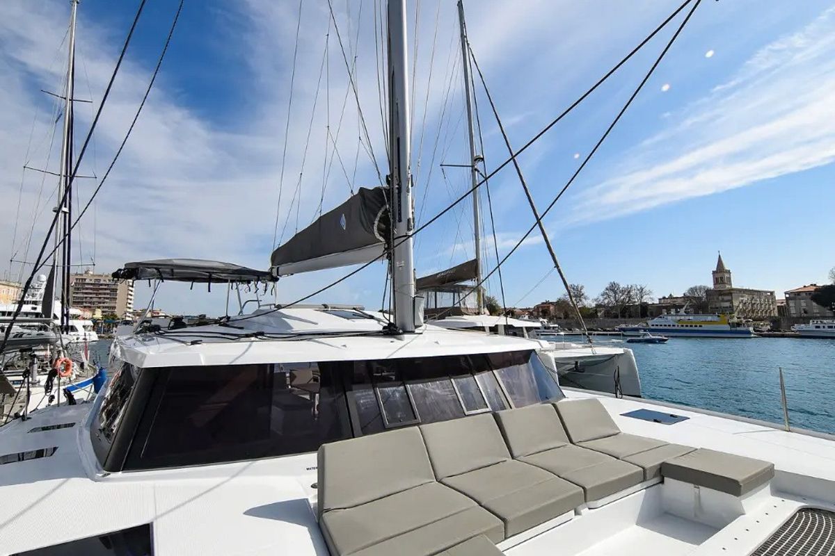 Exterior view of Le Bart, a Fountaine Pajot Astréa 42 catamaran at Radovići, Montenegro
