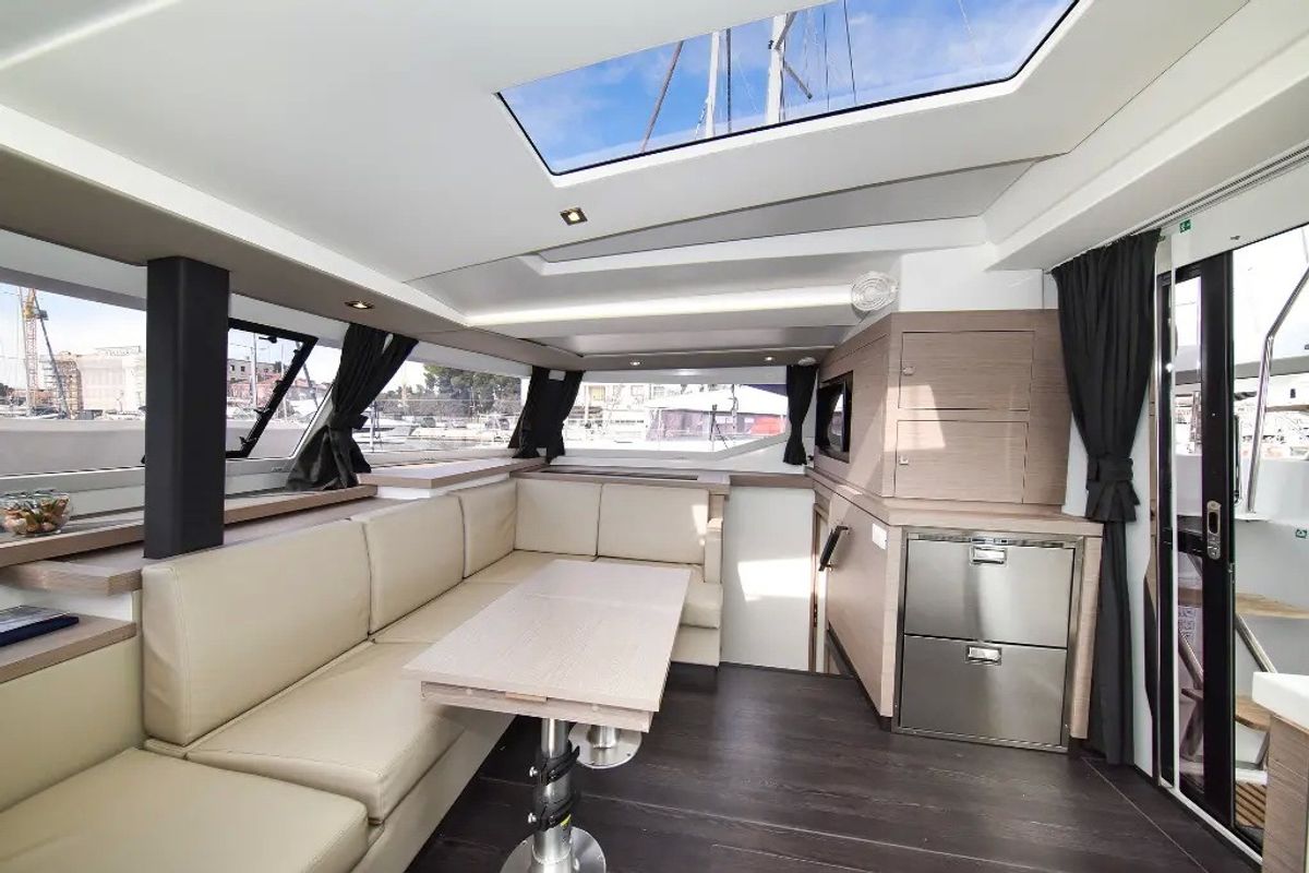 Salon of Le Bart, a Fountaine Pajot Astréa 42 catamaran at Radovići, Montenegro