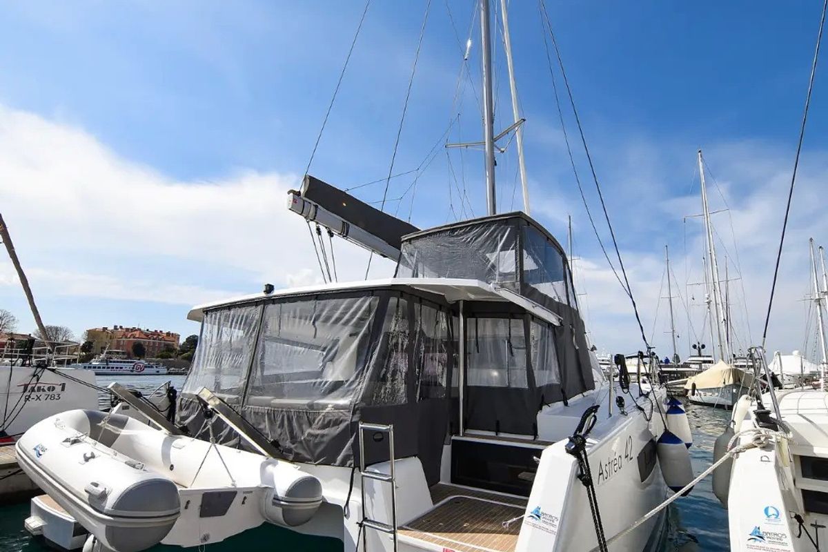 Exterior view of Le Bart, a Fountaine Pajot Astréa 42 catamaran at Radovići, Montenegro
