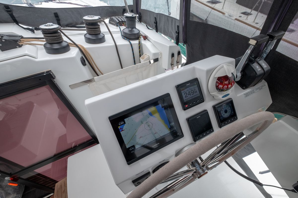 Cockpit of Orestes, a Fountaine Pajot Astréa 42 catamaran at Municipal Unit of Lefkada, Greece