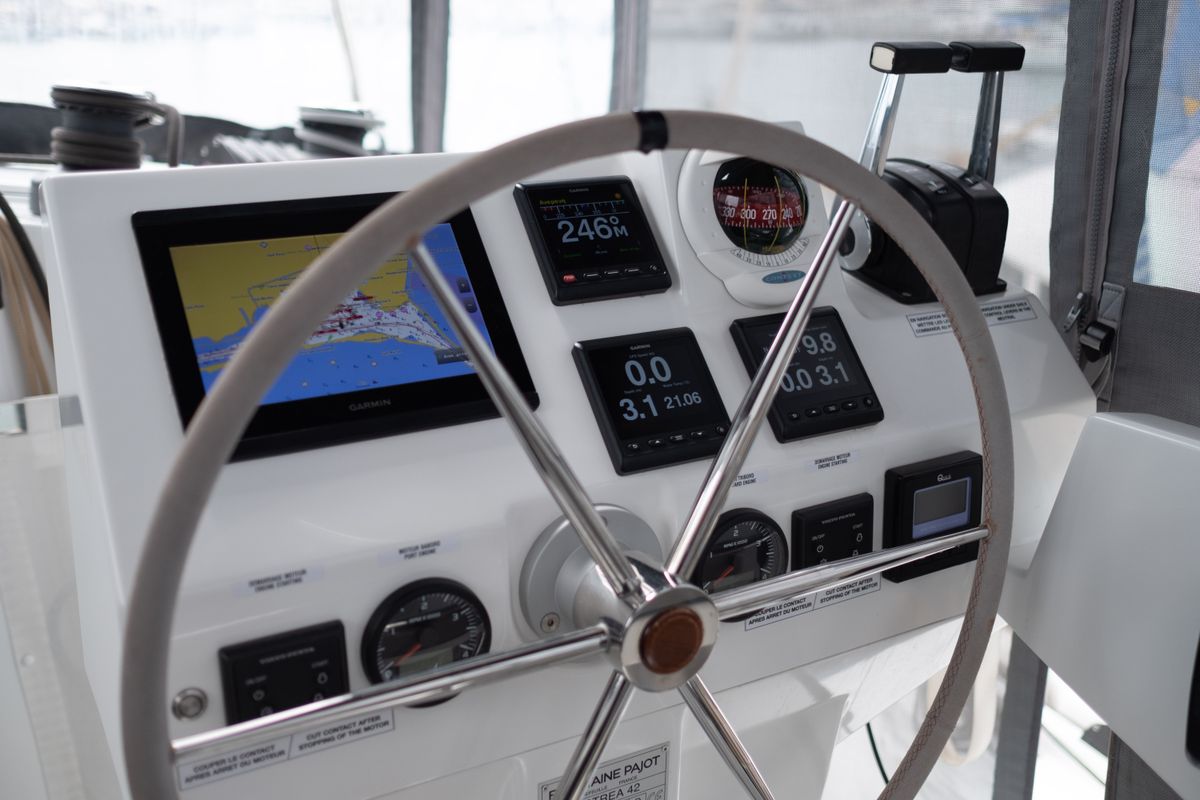 Cockpit of Orestes, a Fountaine Pajot Astréa 42 catamaran at Municipal Unit of Lefkada, Greece