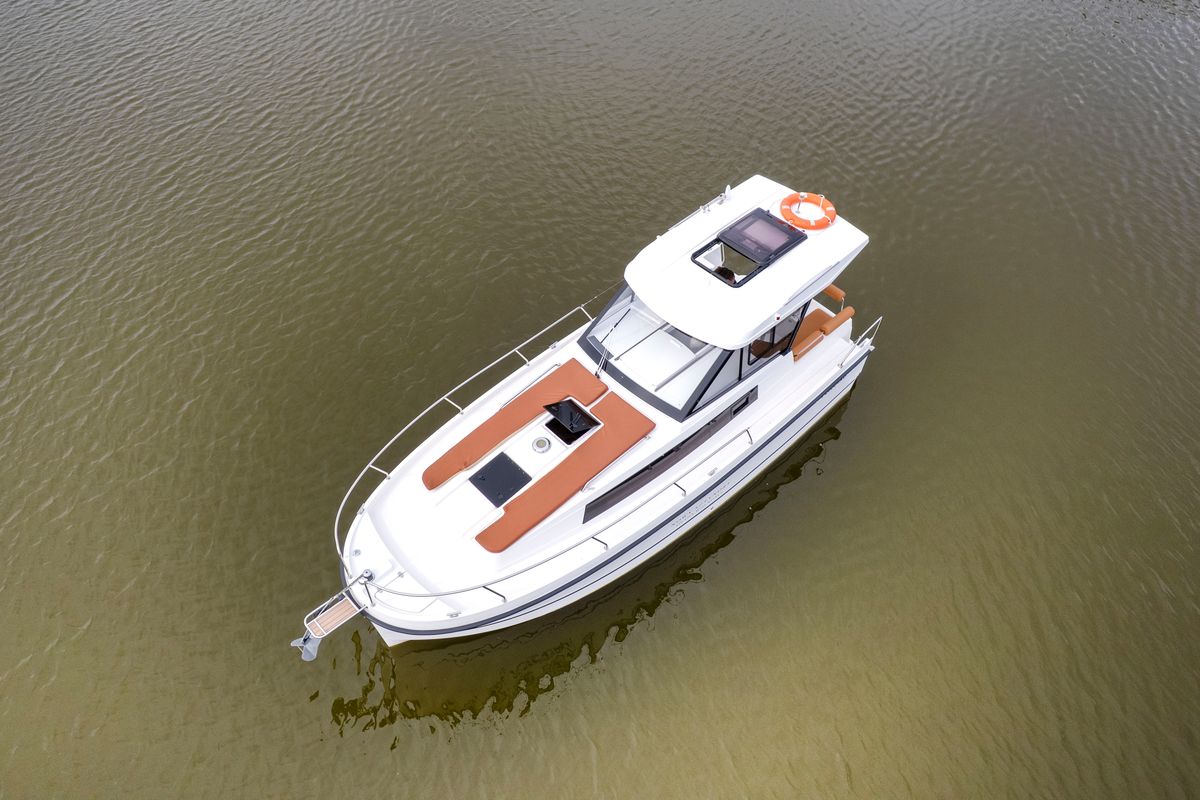 Exterior view of Zanussi, a Northman Nexus Revo 870 Prestige motorboat at Sztynort, Poland
