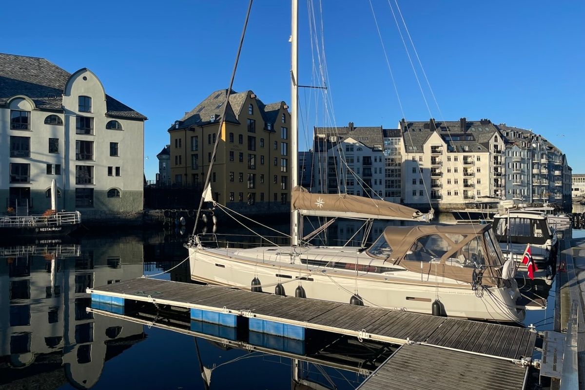 Exterior view of Petrine II, a Jeanneau Sun Odyssey 439 sailboat at Mauseidvågen, Norway