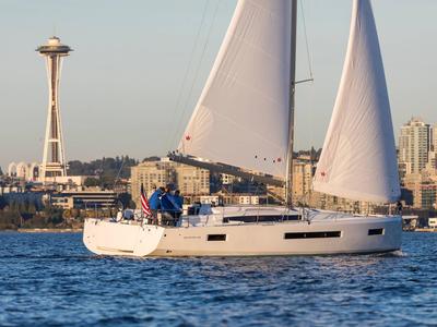 Exterior view of Mila, a Jeanneau Sun Odyssey 490 sailboat at Puntone di Scarlino, Italy