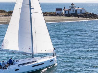 Exterior view of Mila, a Jeanneau Sun Odyssey 490 sailboat at Puntone di Scarlino, Italy