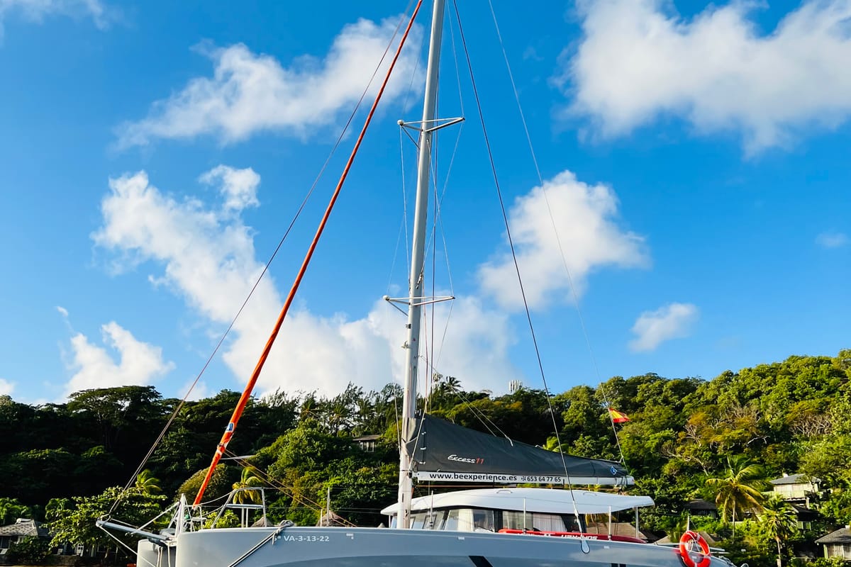 Exterior view of ONE Mallorca BAREBOAT, a Excess 11 catamaran at Port d'Andratx, Spain