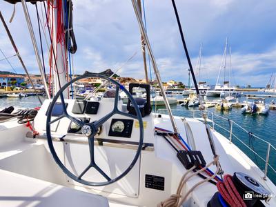 Cockpit of Dafne, a Bali 4.1 catamaran at Cannigione, Italy