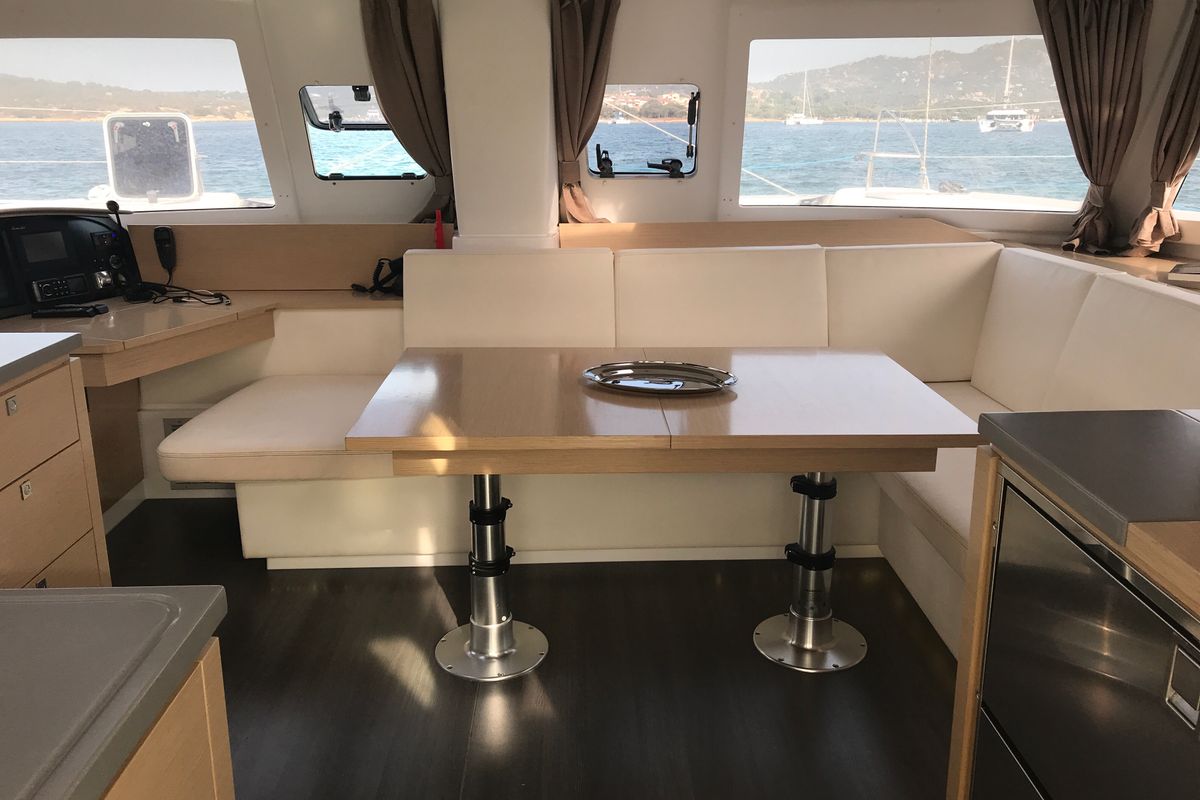 Salon of Pixie Dixie, a Fountaine Pajot Helia 44 catamaran at Olbia, Italy