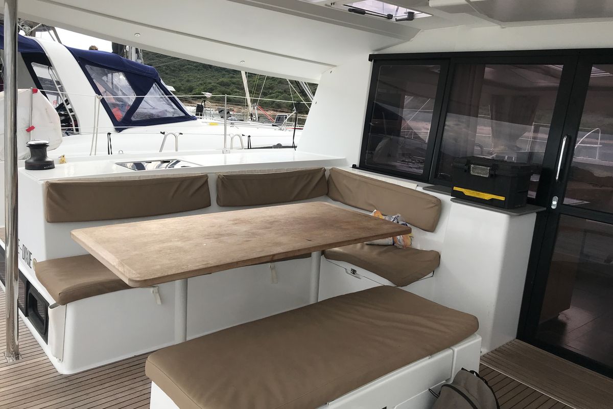 Deck of Pixie Dixie, a Fountaine Pajot Helia 44 catamaran at Olbia, Italy