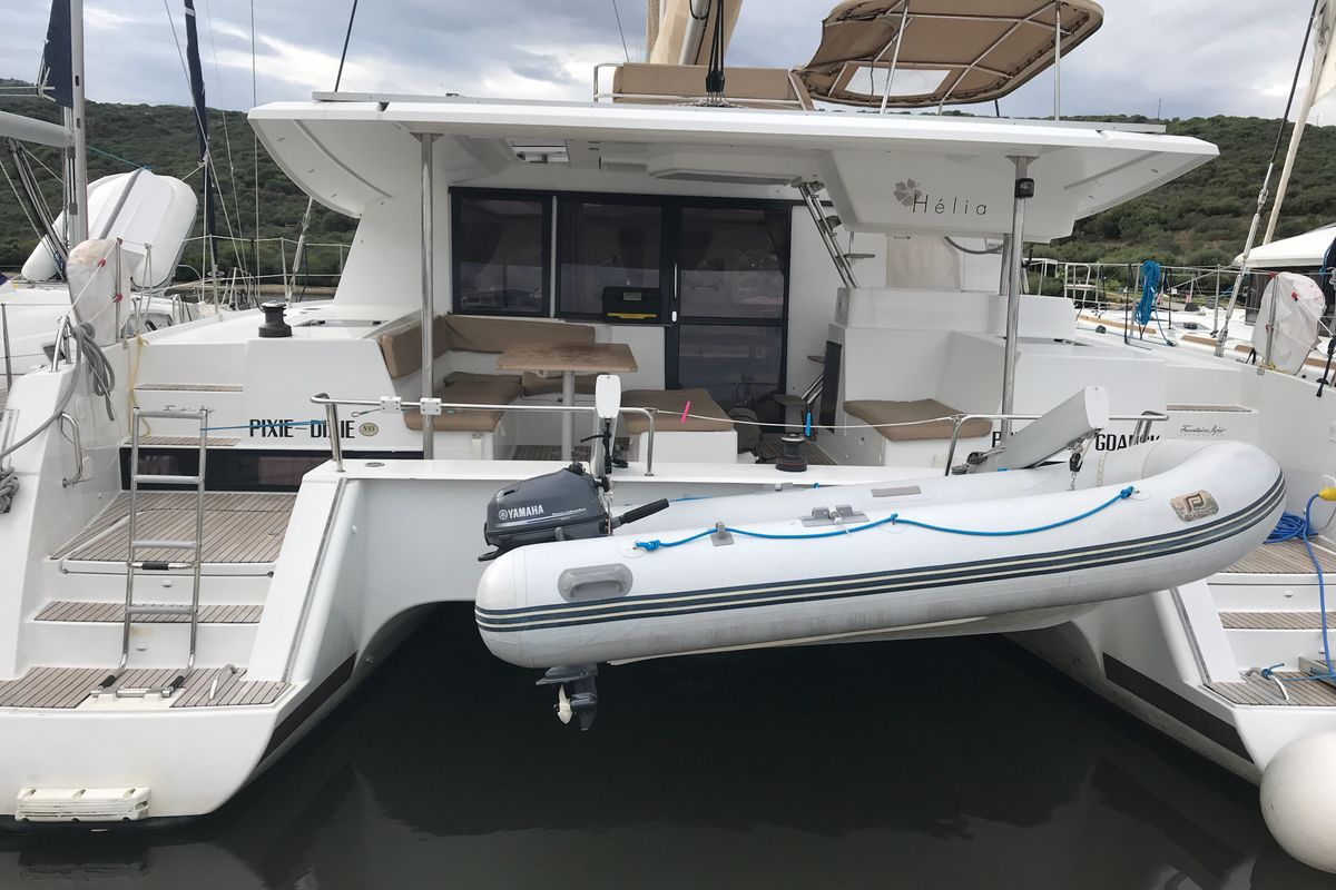 Exterior view of Pixie Dixie, a Fountaine Pajot Helia 44 catamaran at Olbia, Italy